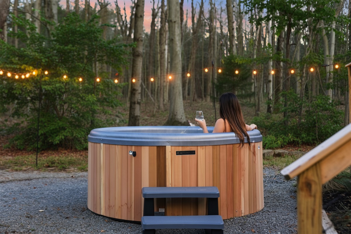 Sit and watch deer while soaking in a luxury cedar barrel hot tub