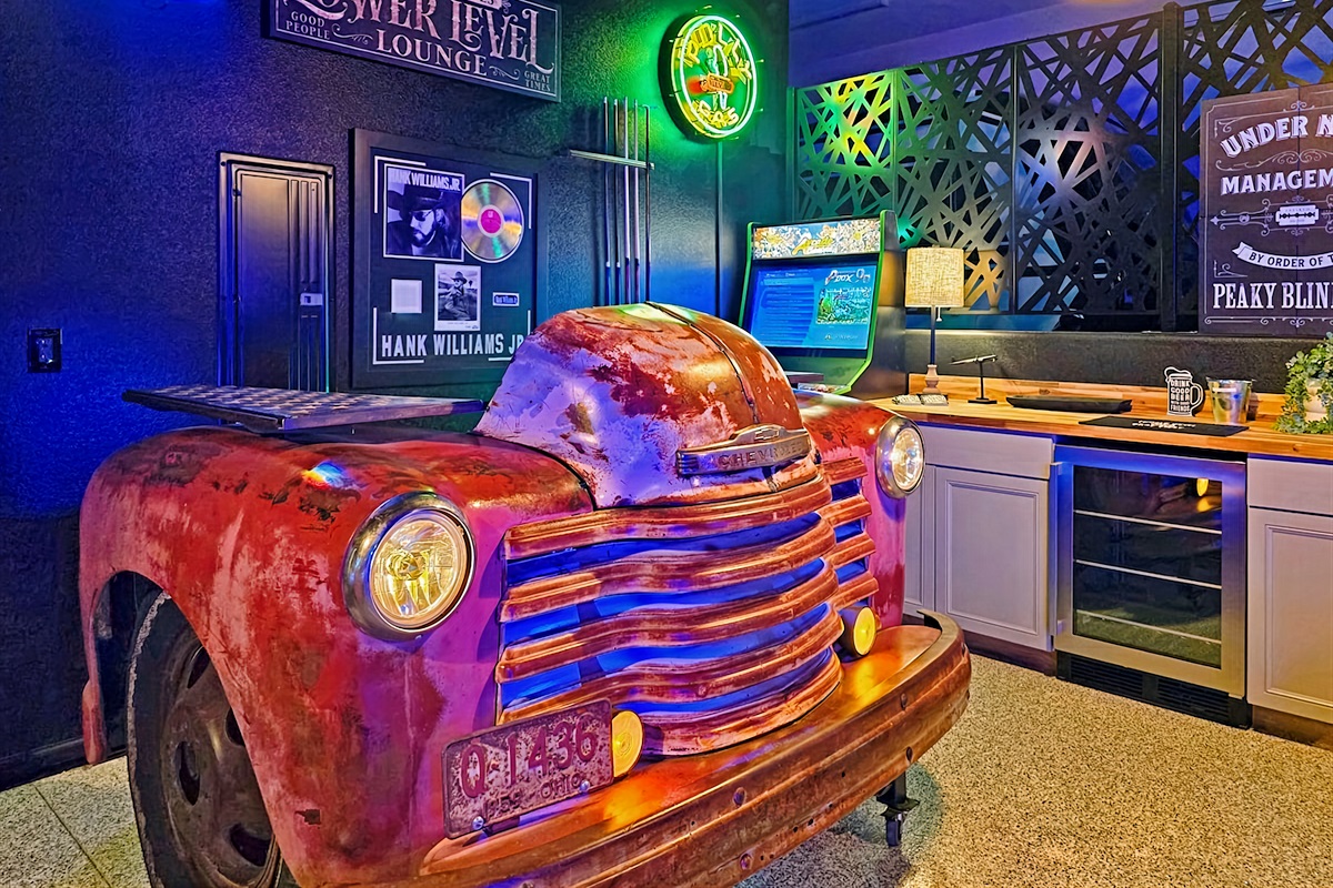 Beverage refrigerator in the game room frees up space in the kitchen refrigerator.