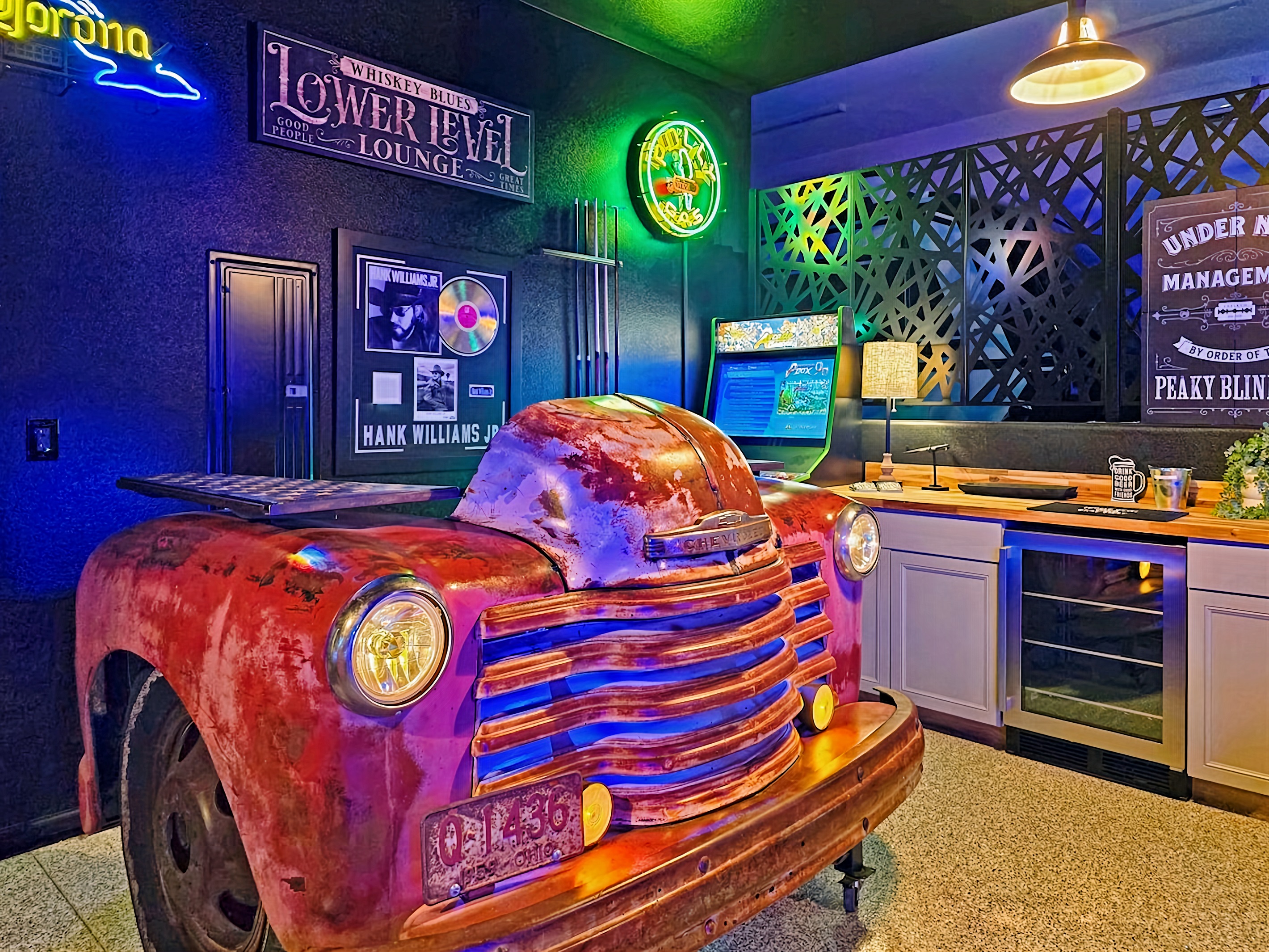 Beverage refrigerator in the game room frees up space in the kitchen refrigerator.