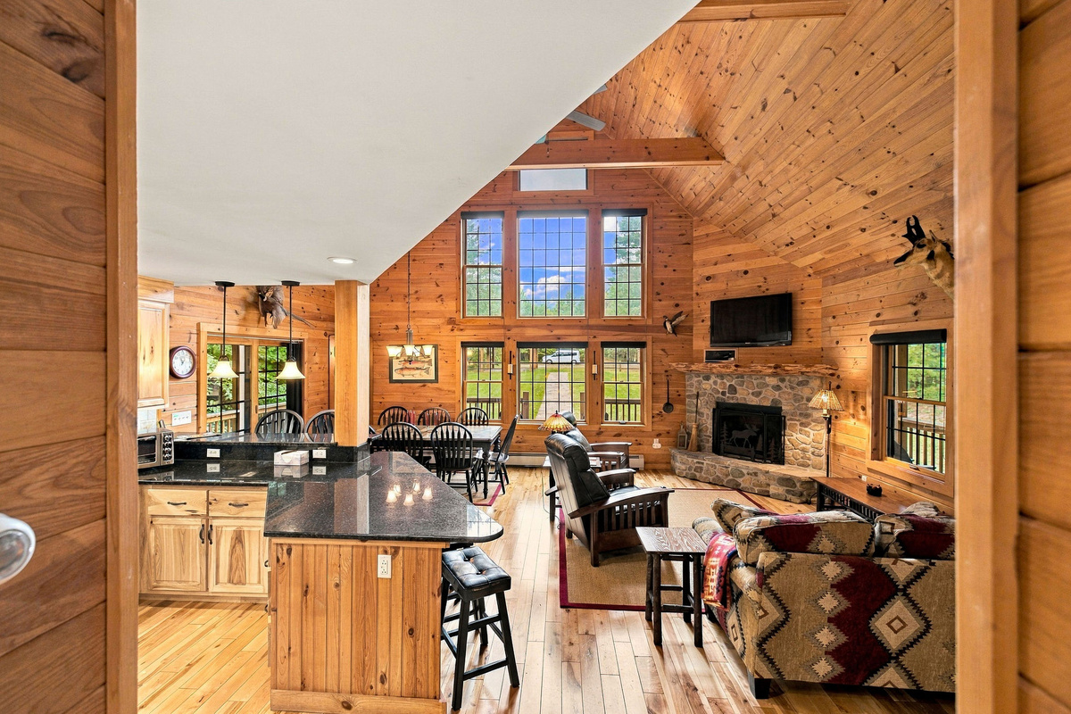 The open-concept layout makes it easy to cook, dine, and spend time together. Incredible views of Whiteface Mountain can be seen in the expansive windows.