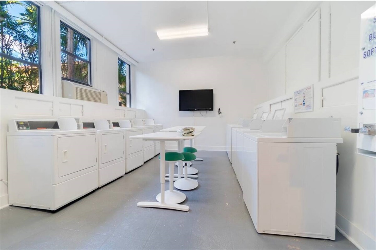 Bright sunny laundry room for Palm Beach Hotel guests off the main level. All new cc operated washer/dryers.