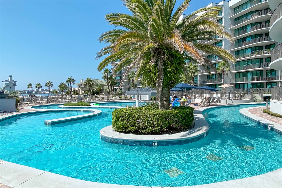 Your personal oasis awaits. Enjoy endless relaxation in this incredible lazy river and pool complex, right outside your door.