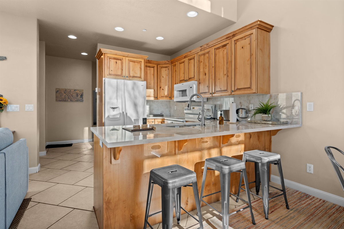 Spacious breakfast bar perfect for casual dining, entertaining, or planning your next adventure.