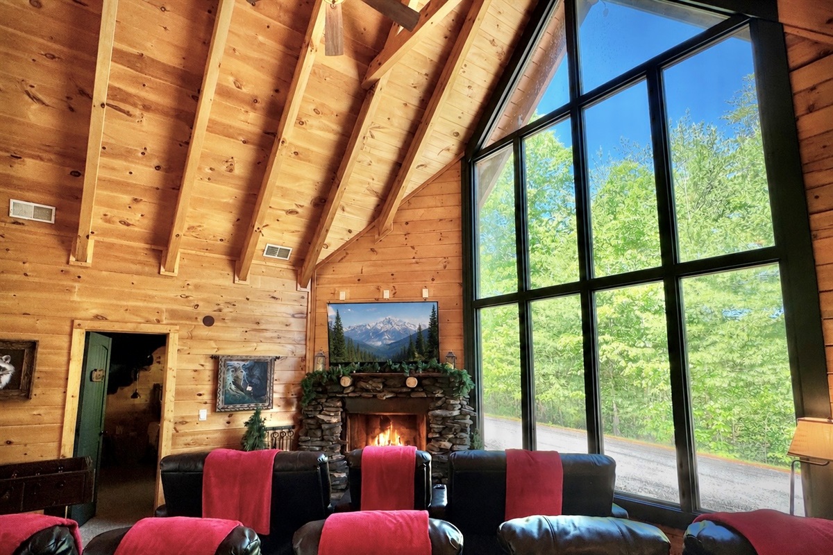 Theater Area, 10 leather recliners and wood burning fireplace.