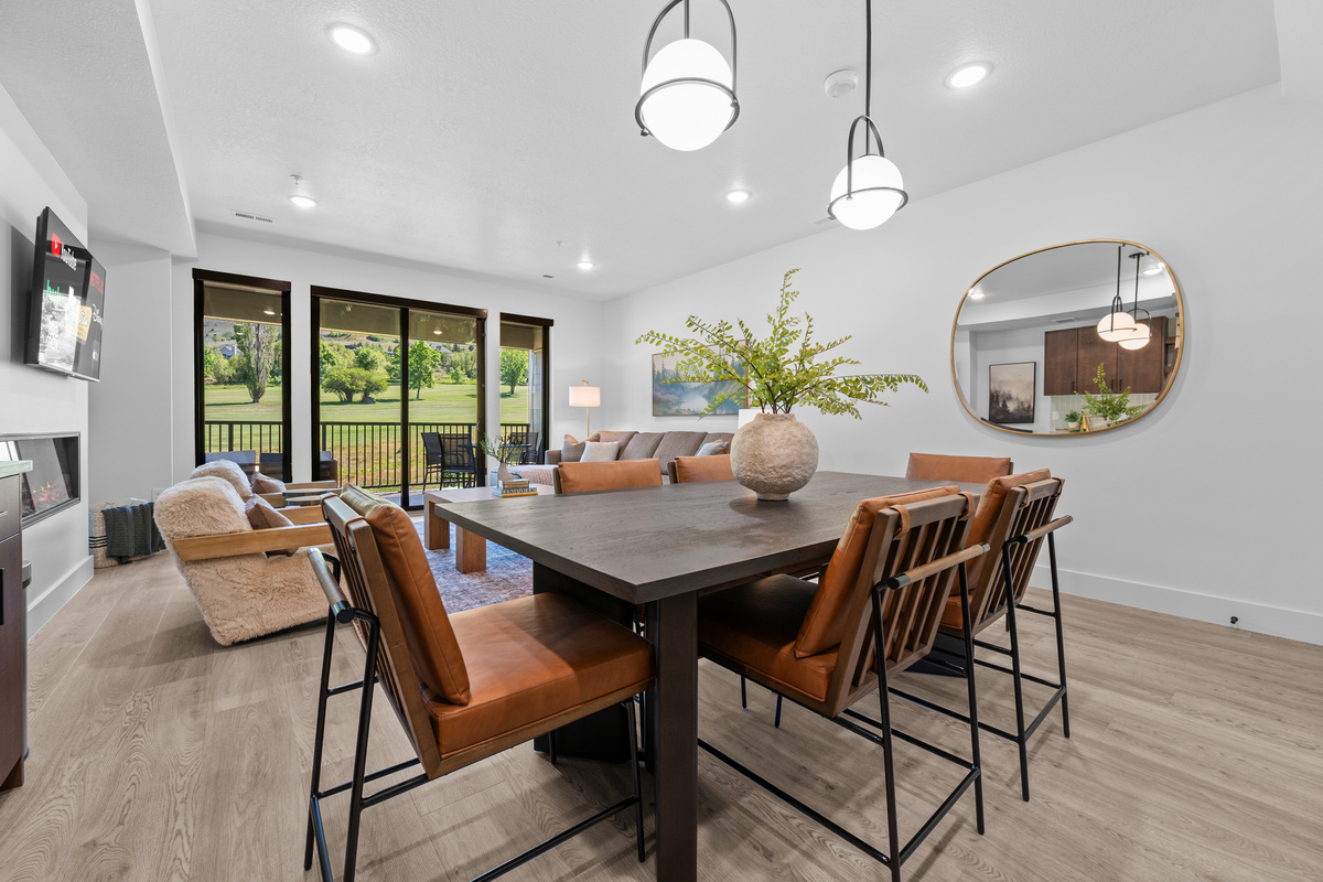 Dining area with seating for family meals and game nights.