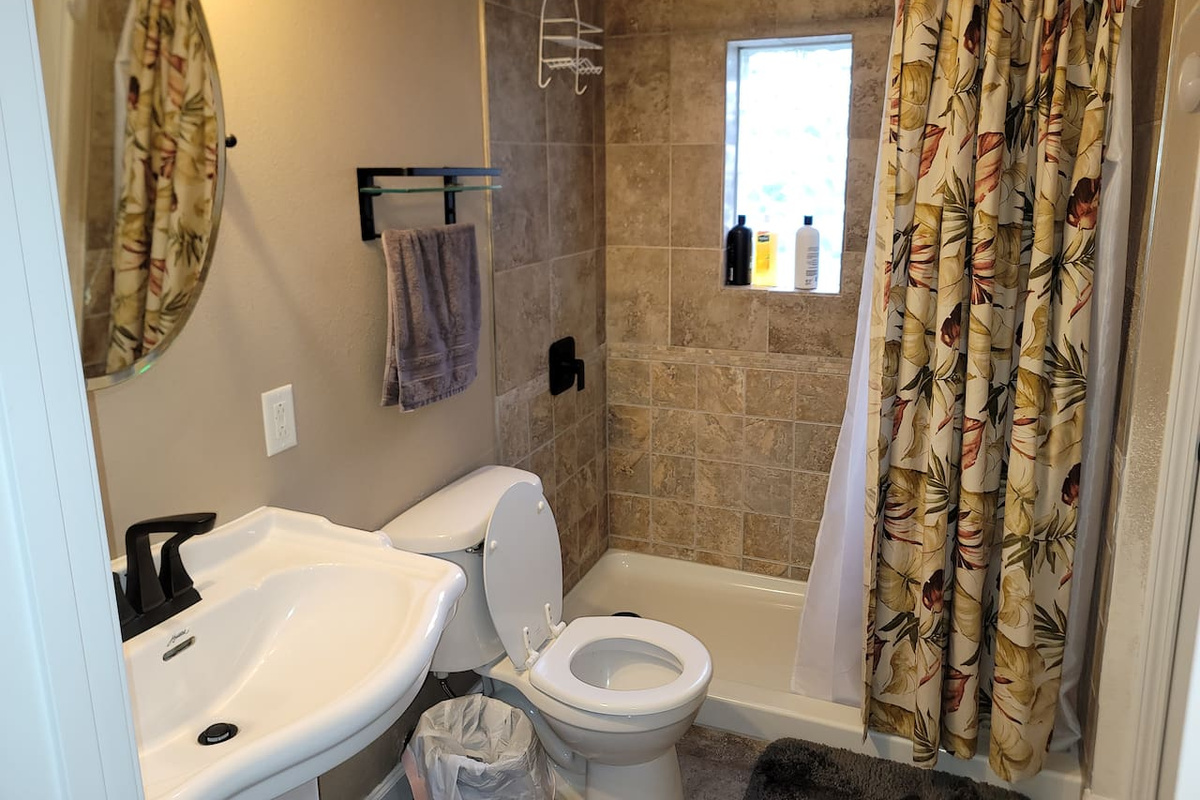 newly renovated bathroom, shampoo, shower gel provided