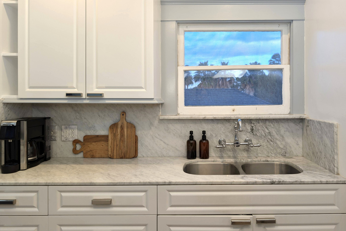 Bright, clean, and fully equipped, this beautiful kitchen has everything you need to prepare meals and feel right at home.