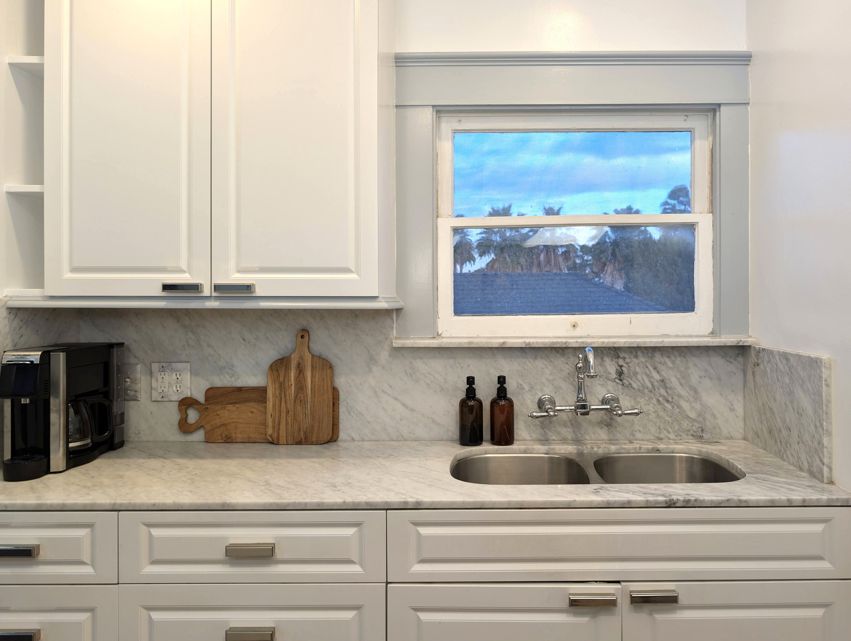 Bright, clean, and fully equipped, this beautiful kitchen has everything you need to prepare meals and feel right at home.