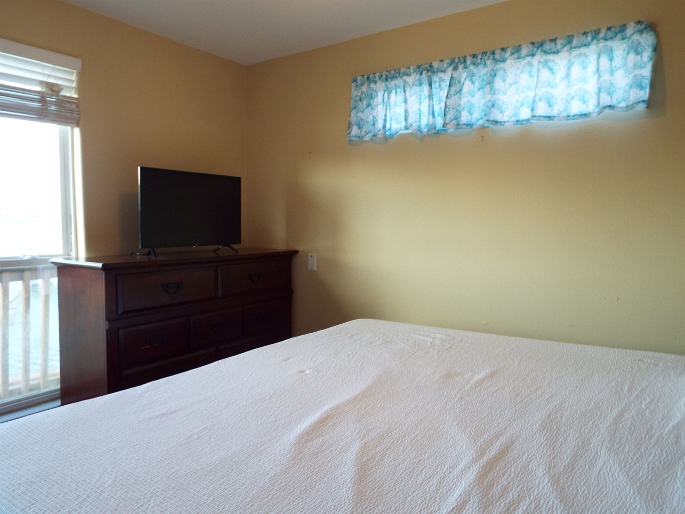 Flat screen in bedroom