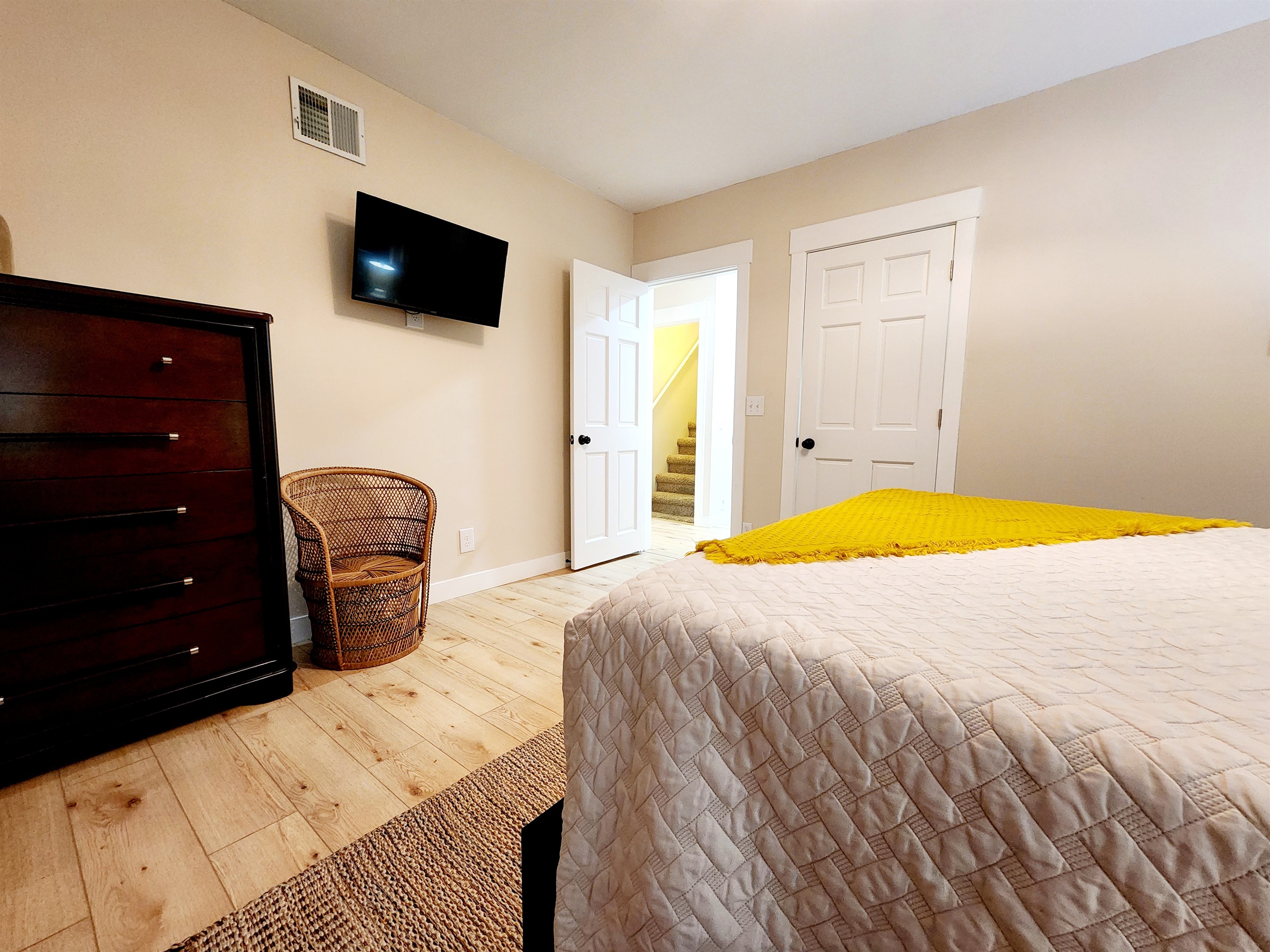 Bedroom #2 with smart tv and a cozy bed.
