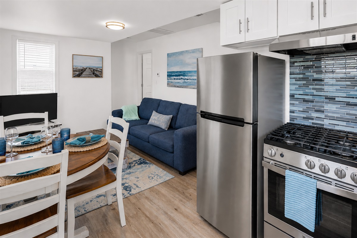 Drop the bags, grab a seat, and pour the first glass of wine. This open kitchen/living/dining room is where you and yours lands the second you walk in.