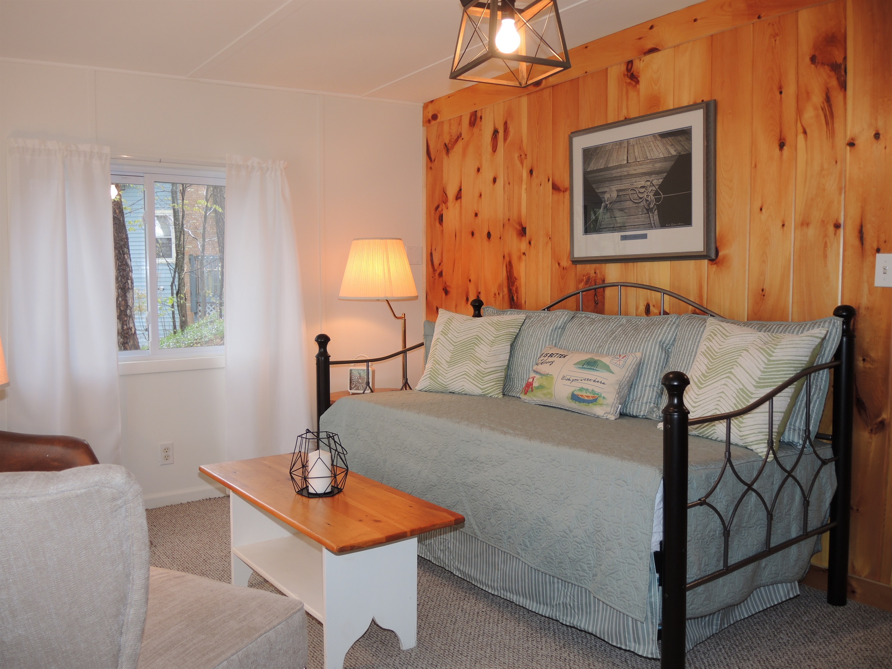 Lower level sunroom with daybed