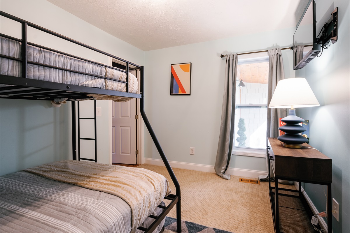 Main level bedroom with bunk bed & pull out trundle bed (BR 2)