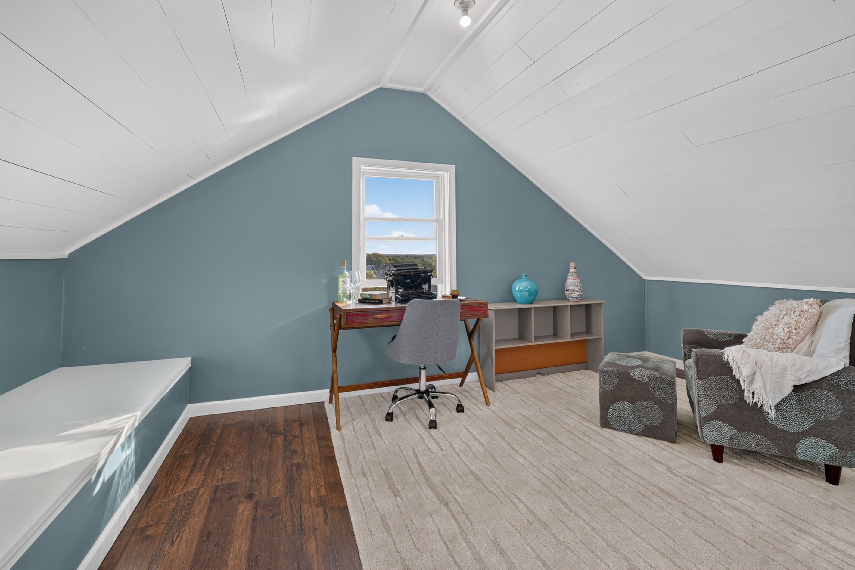 A bright and versatile space with plenty of room to relax, work, or unwind.