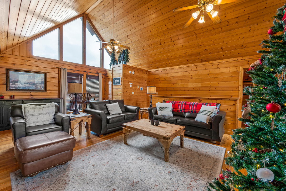 Comfortable leather sofas, great for cozying up by the fireplace, in the upstairs living room.