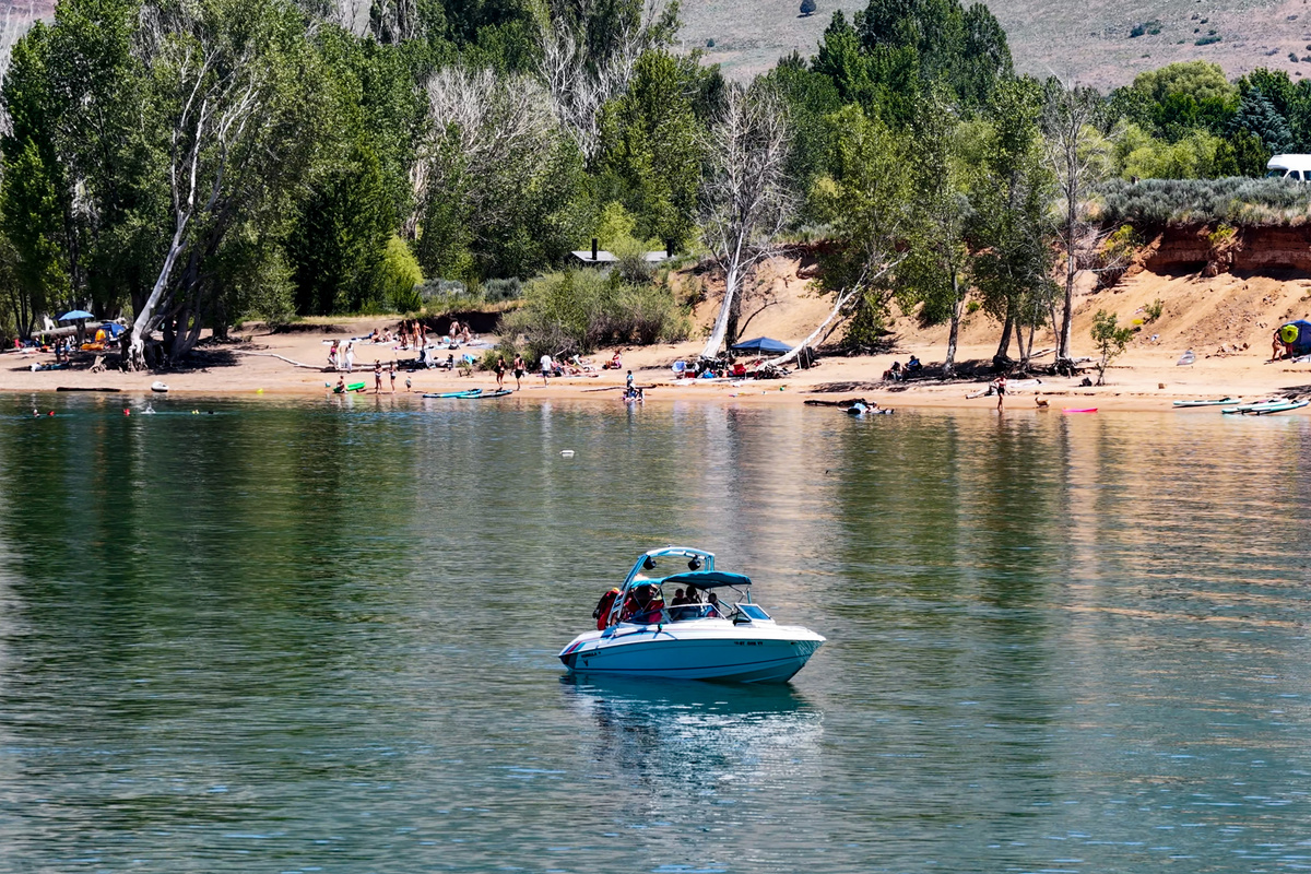 Enjoy endless summer fun on Pineview Reservoir with boating, swimming, paddleboarding, and sandy beach access surrounded by stunning mountain scenery.