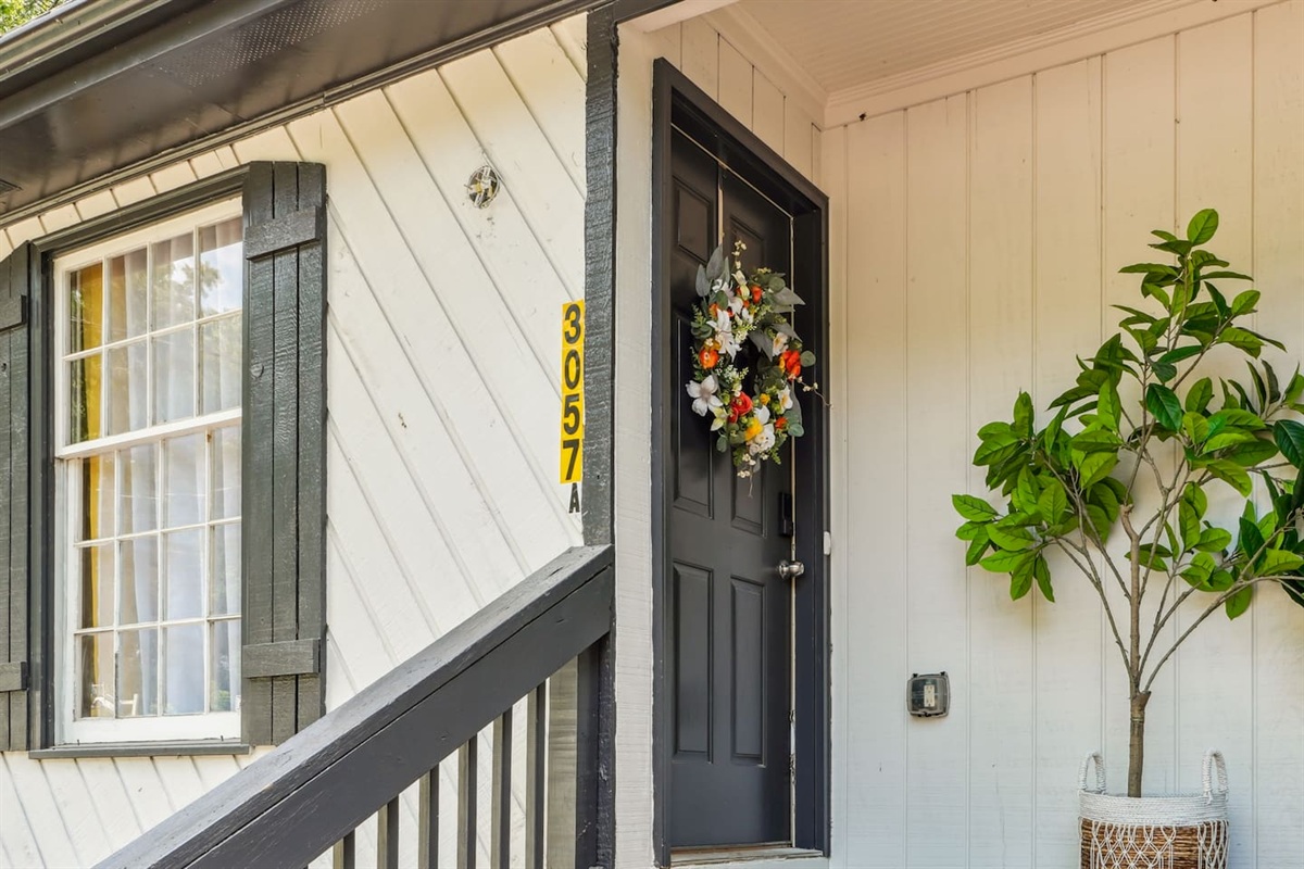 The exterior showcases our triplex property. Your unit, Unit A, is located on the far left side with easy access using our Eufy powered smart lock.