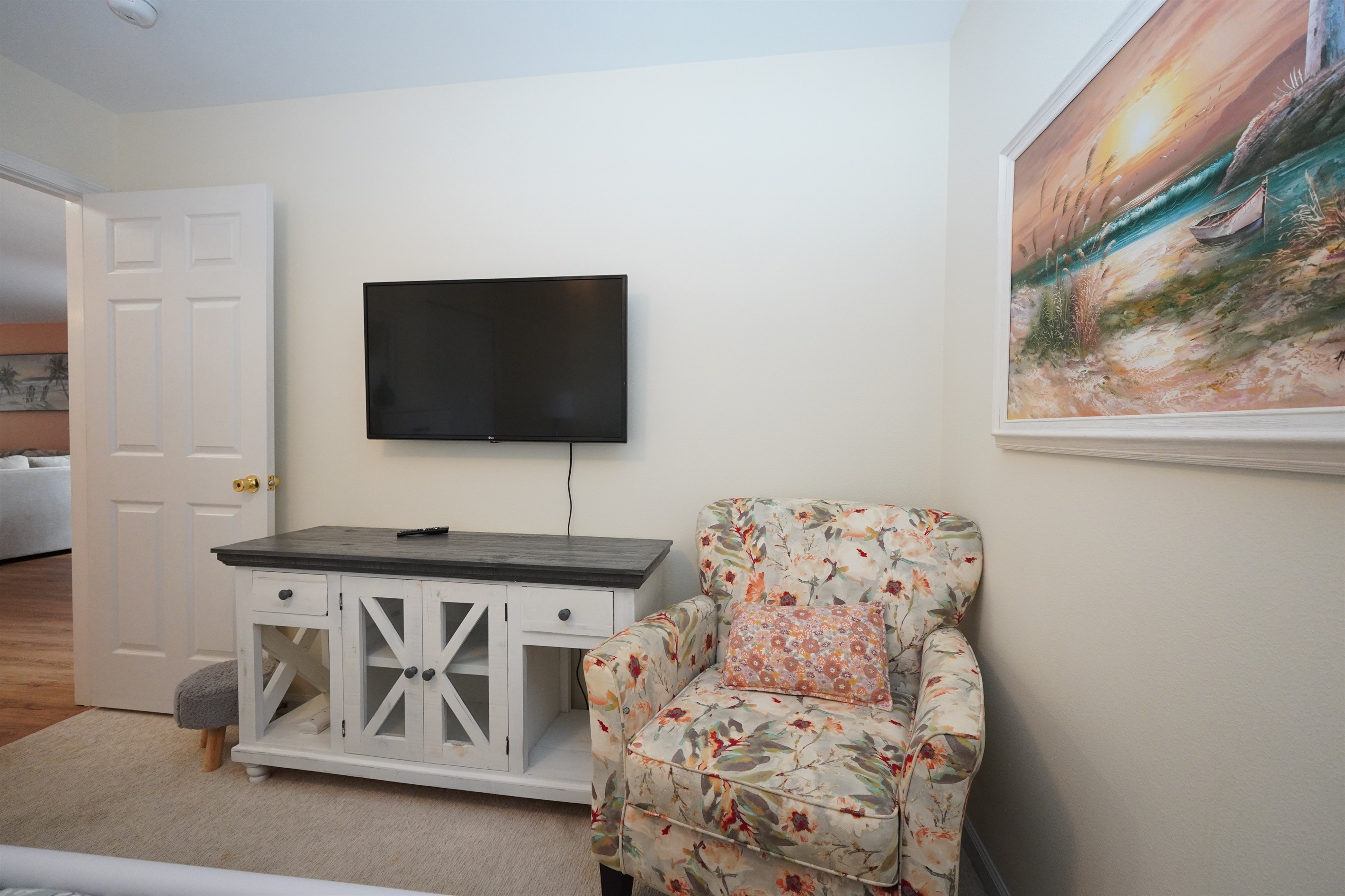 2nd Bedroom Seating and Mounted Flatscreen TV