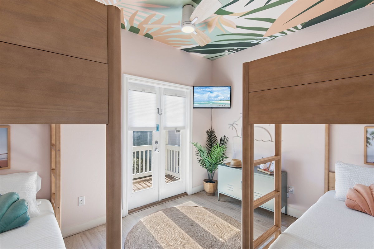 Guest Room 4 (Level 2): Two Twin Bunk Beds, Smart TV, Balcony Access, Hallway Bathroom with Shower Tub Combo on Level 2 or Bathroom with Walk in Shower on Level 1 (Sleeps 4)