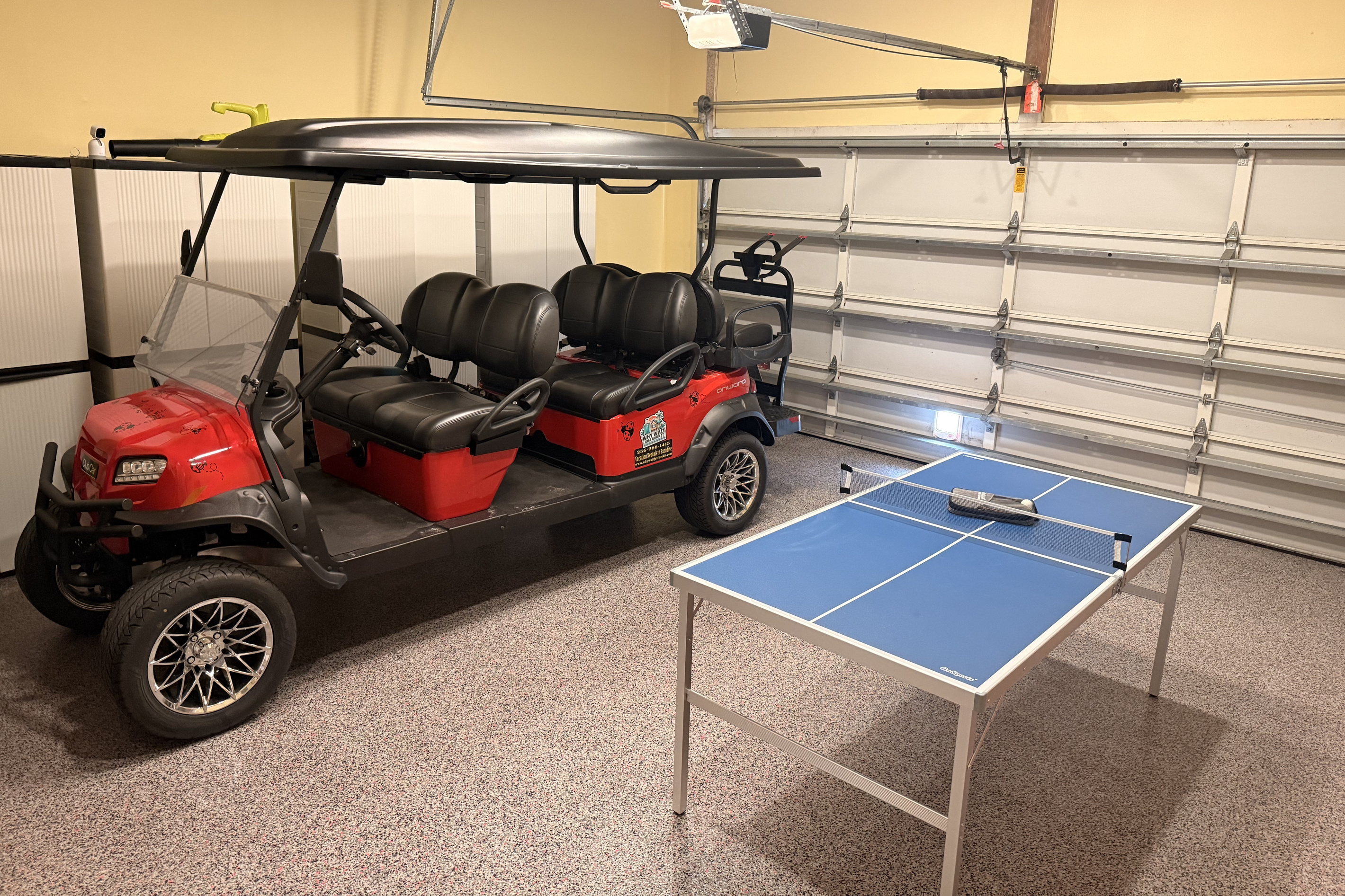 Six seater golf cart for guest use + ping pong table