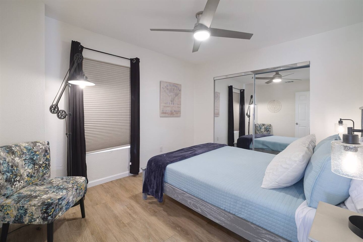 Drift into restful nights in this serene upstairs queen bedroom, where soft textures and calming tones create the perfect retreat after a day of exploring. A quiet, cozy space designed for comfort and recharge.