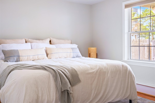 This is our second basement bedroom, with a luxurious king bed!