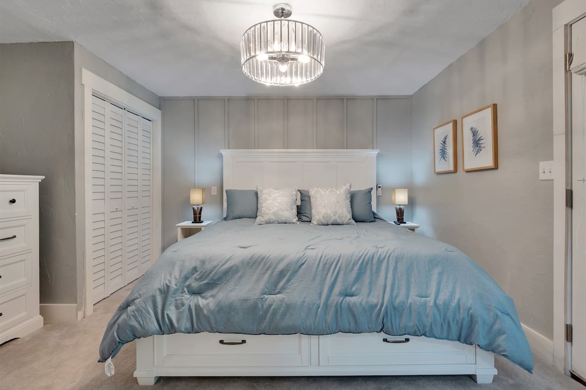 Main floor, master, king bed, tv, front porch access, en-suite bathroom