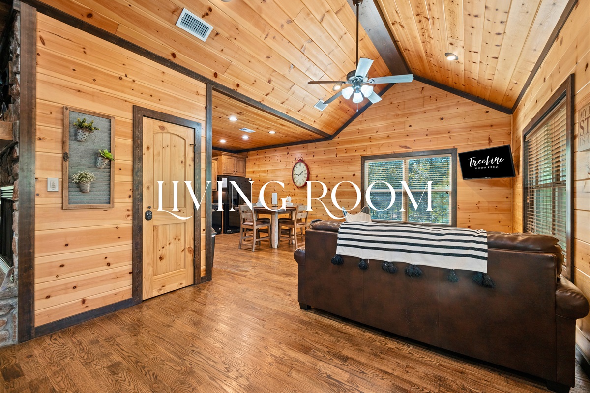 Inviting living room with rustic charm and natural wood interior.