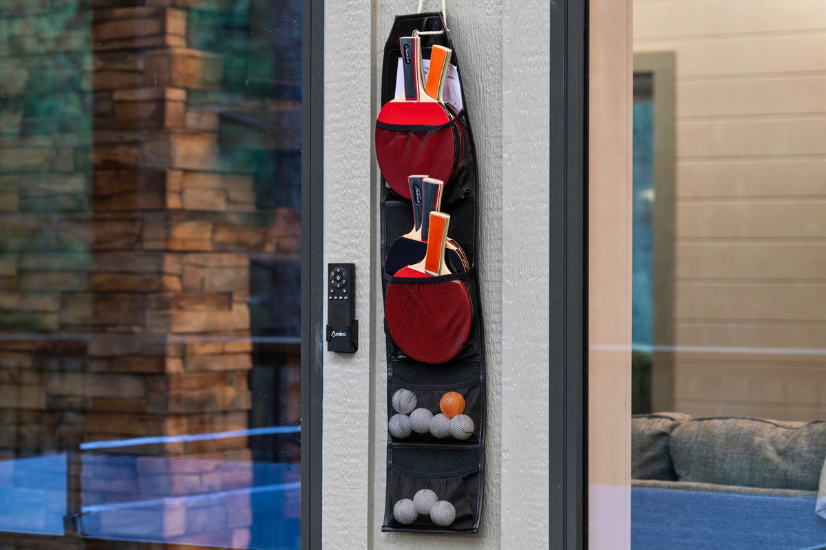 A tidy and organized game setup keeps the fun going, with paddles and accessories ready whenever the mood strikes.