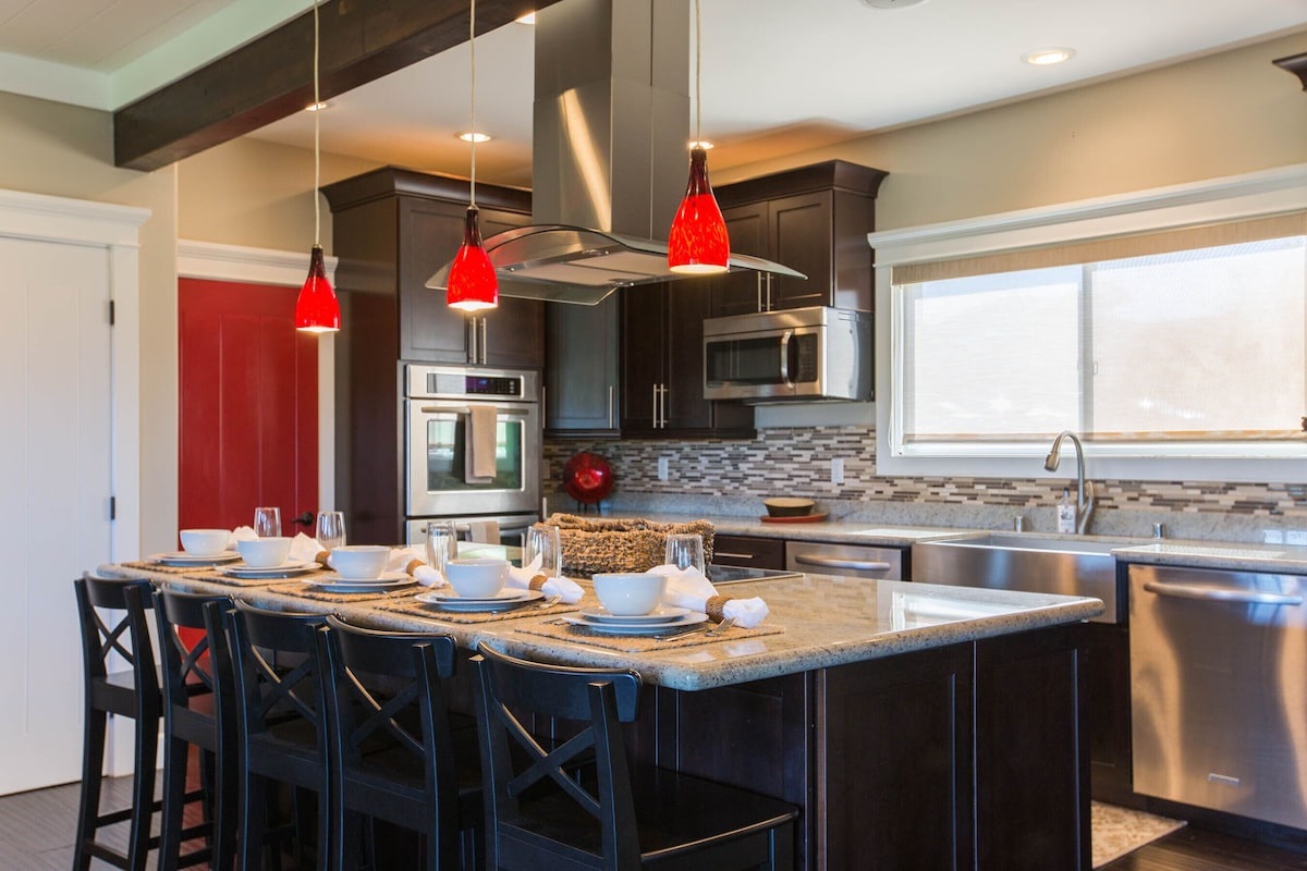 Fully stocked kitchen with all new stainless steel appliances.