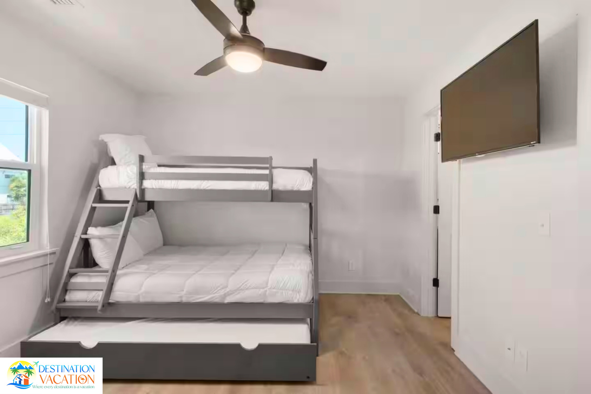 Comfort meets versatility with this stylish bunk bedroom.