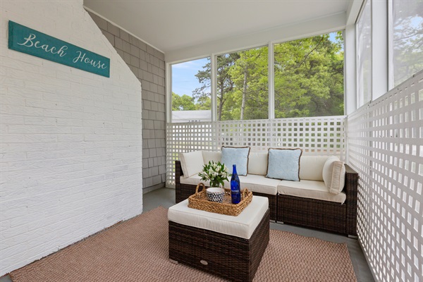 A screened-in outdoor space to unwind, enjoy the breeze, and stay bug-free!
