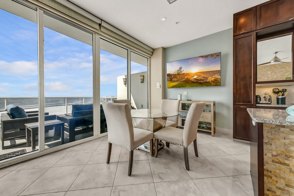 Rainy day?  No problem with indoor dining!  Enjoy the same views of the Gulf no matter how bad the weather is. Also enjoy cable, Netflix, and more on the 75-inch LG Smart TV!