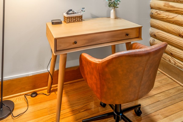 Dedicated workspace with desk and chair perfect for remote work, Zoom calls, or quick check-ins (WiFi included).