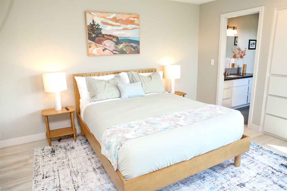 Pines by the sea ensuite bedroom with queen bed