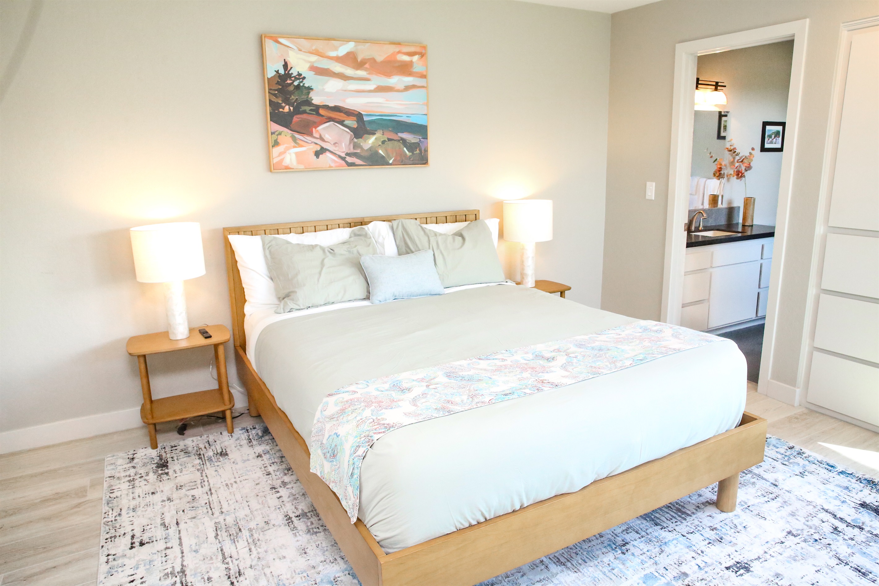 Pines by the sea ensuite bedroom with queen bed