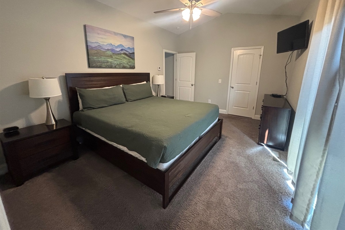 Master Bedroom with ensuite master bath and balcony!