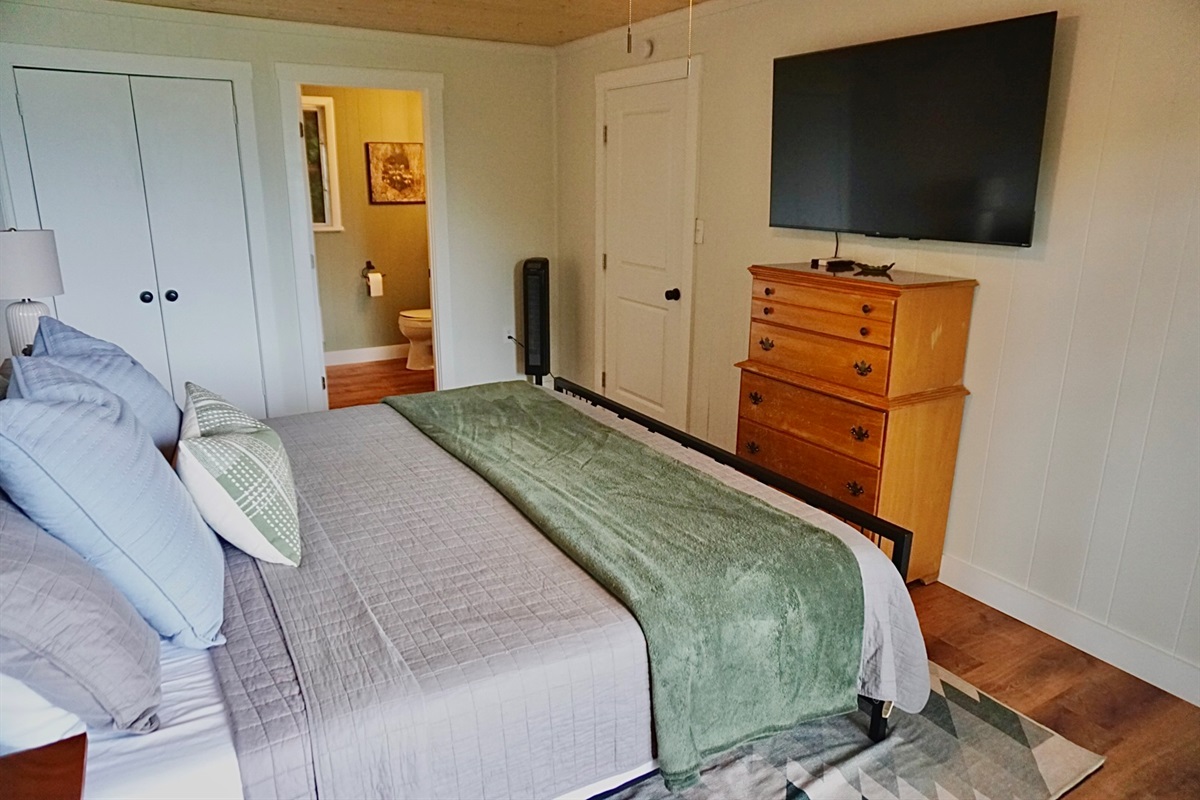 Sleep soundly on a plush bed with modern amenities and scenic mountain views!