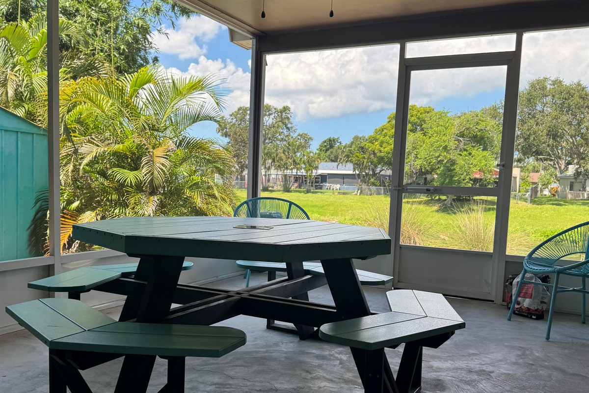 Patio area - covered and screened in overlooking the pond