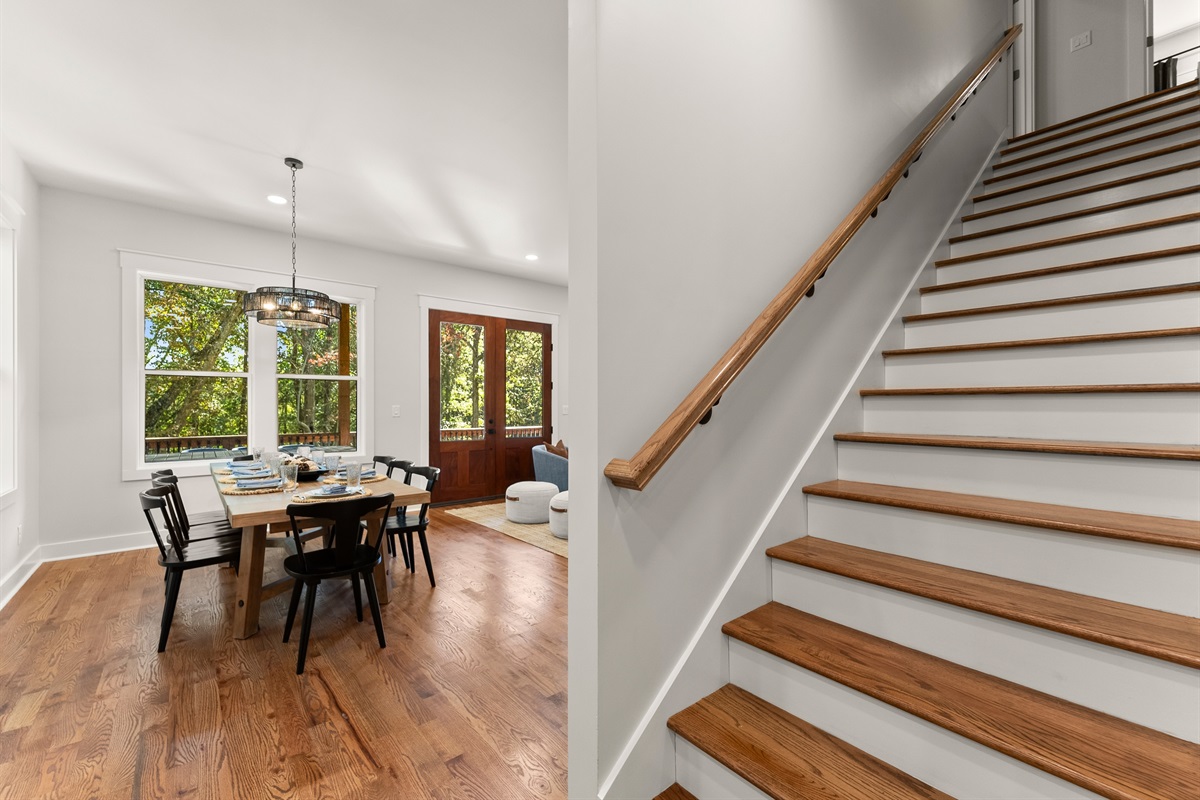 Stairway leading upstairs from the kitchen.