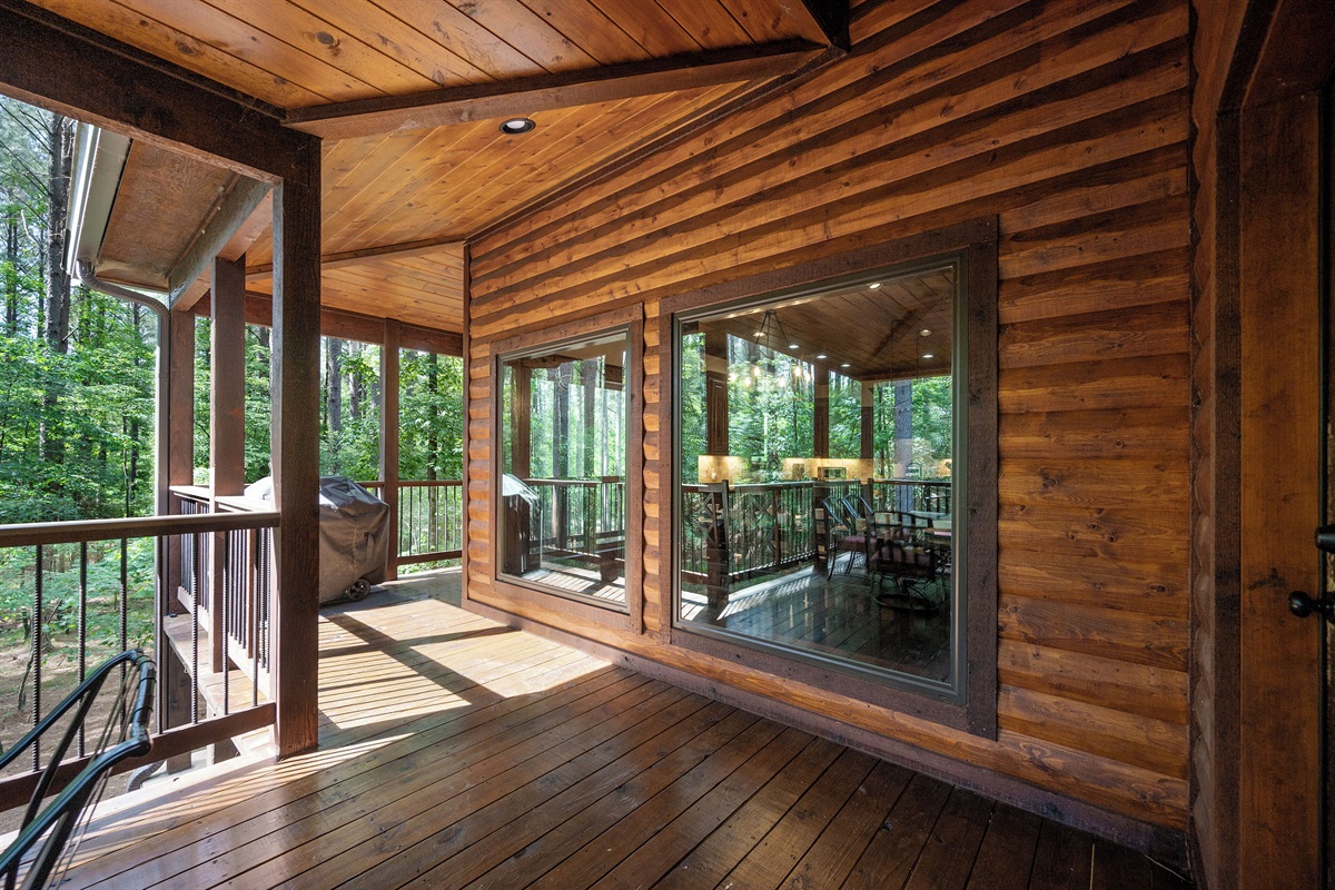 The large picture windows showcase the beautiful outdoor views 