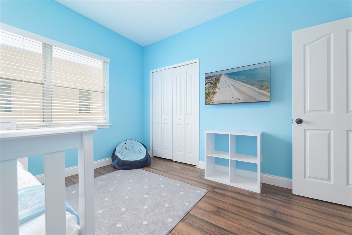 Bright and playful with beachy blue walls