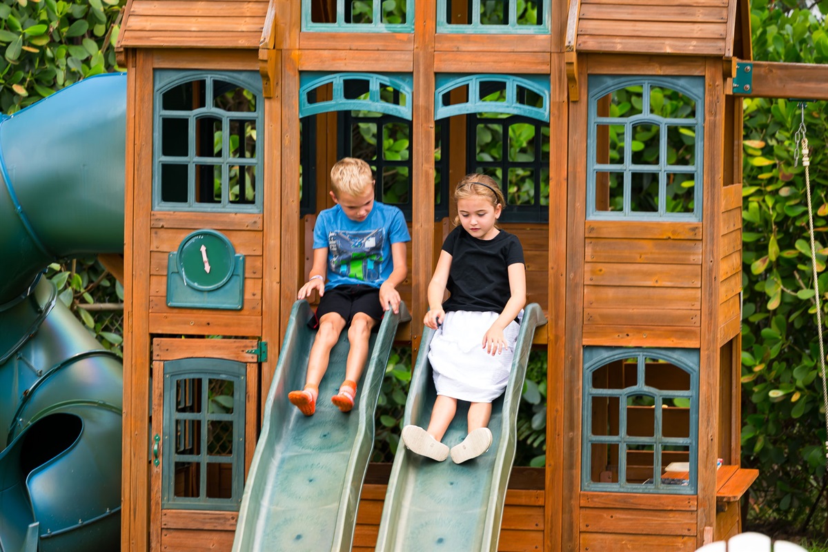 Watch from the pool or patio while the kids enjoy their own outdoor paradise.