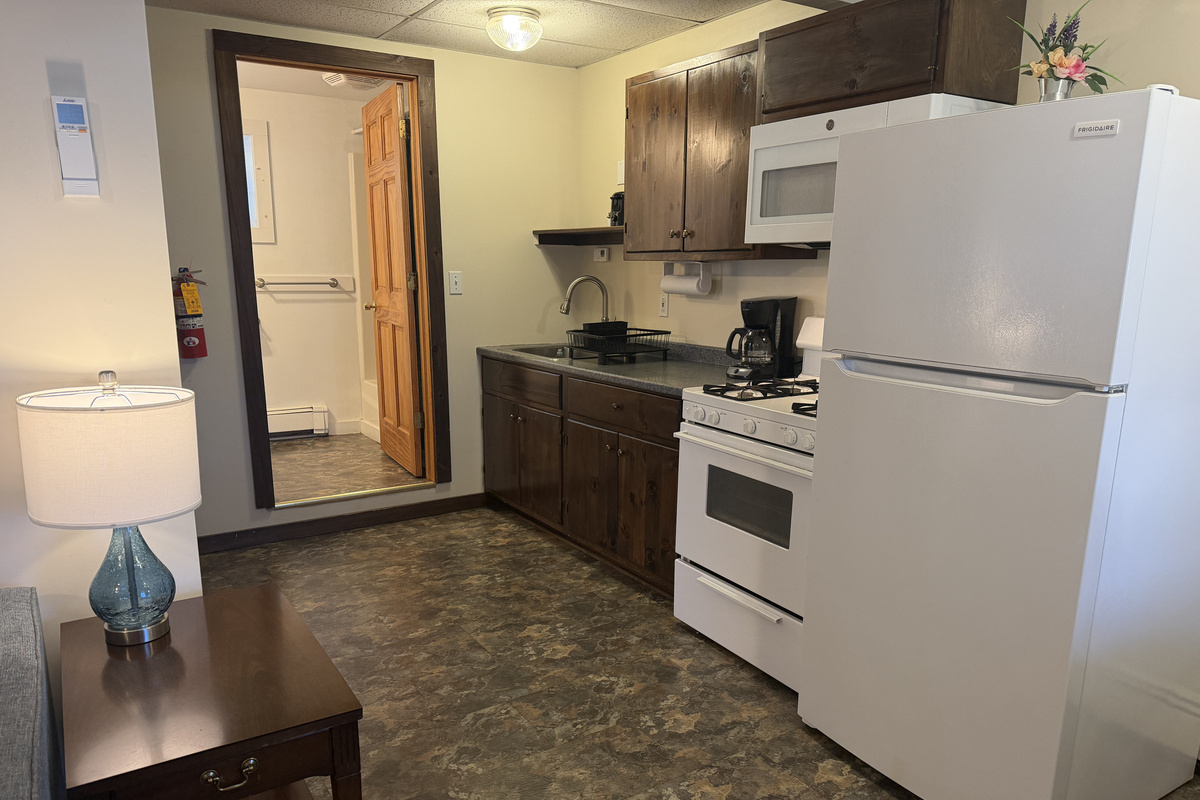 Eat-in Kitchen with bathroom beyond
