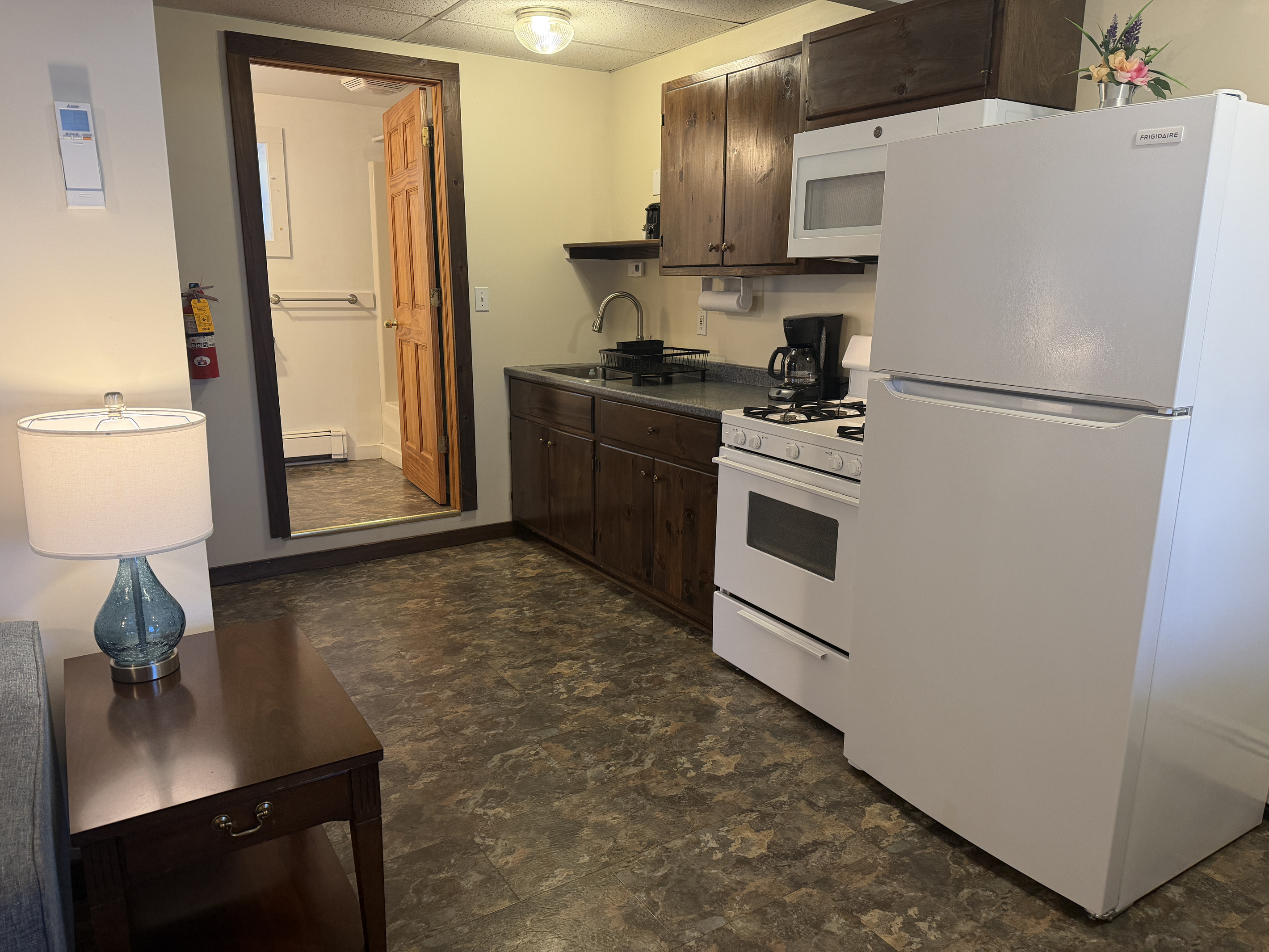 Eat-in Kitchen with bathroom beyond