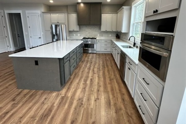 Island seats 5 with an additional two stools in the dining area. Kitchen table upgrade coming soon to accommodate even more guests. Plenty of pantry space, kitchen appliances, dishes, mugs, etc.