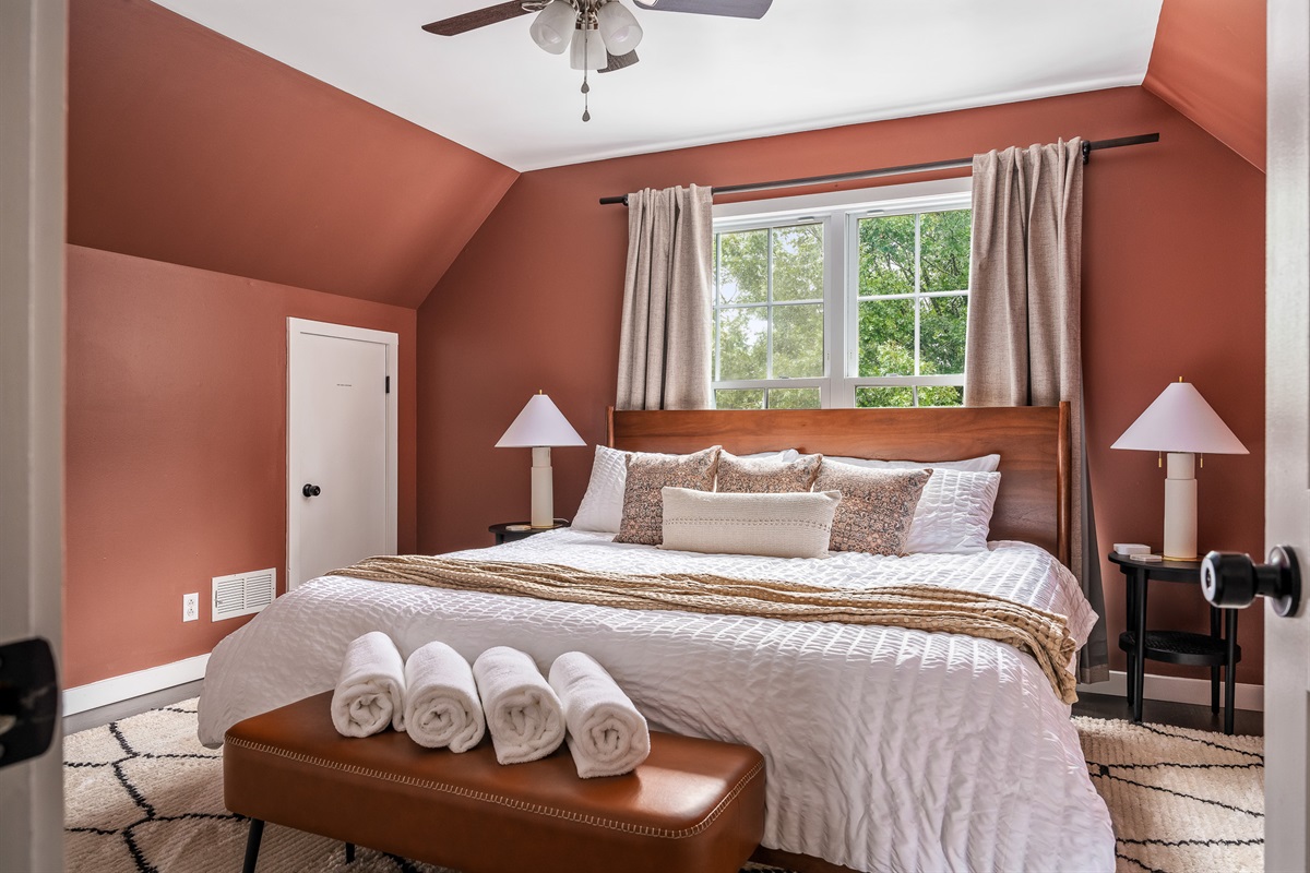 Rest easy in warm, elevated style This upstairs king bedroom combines earthy tones, plush textures, and natural light to create a space that’s both inviting and effortlessly chic. 🛏️🌞🌿