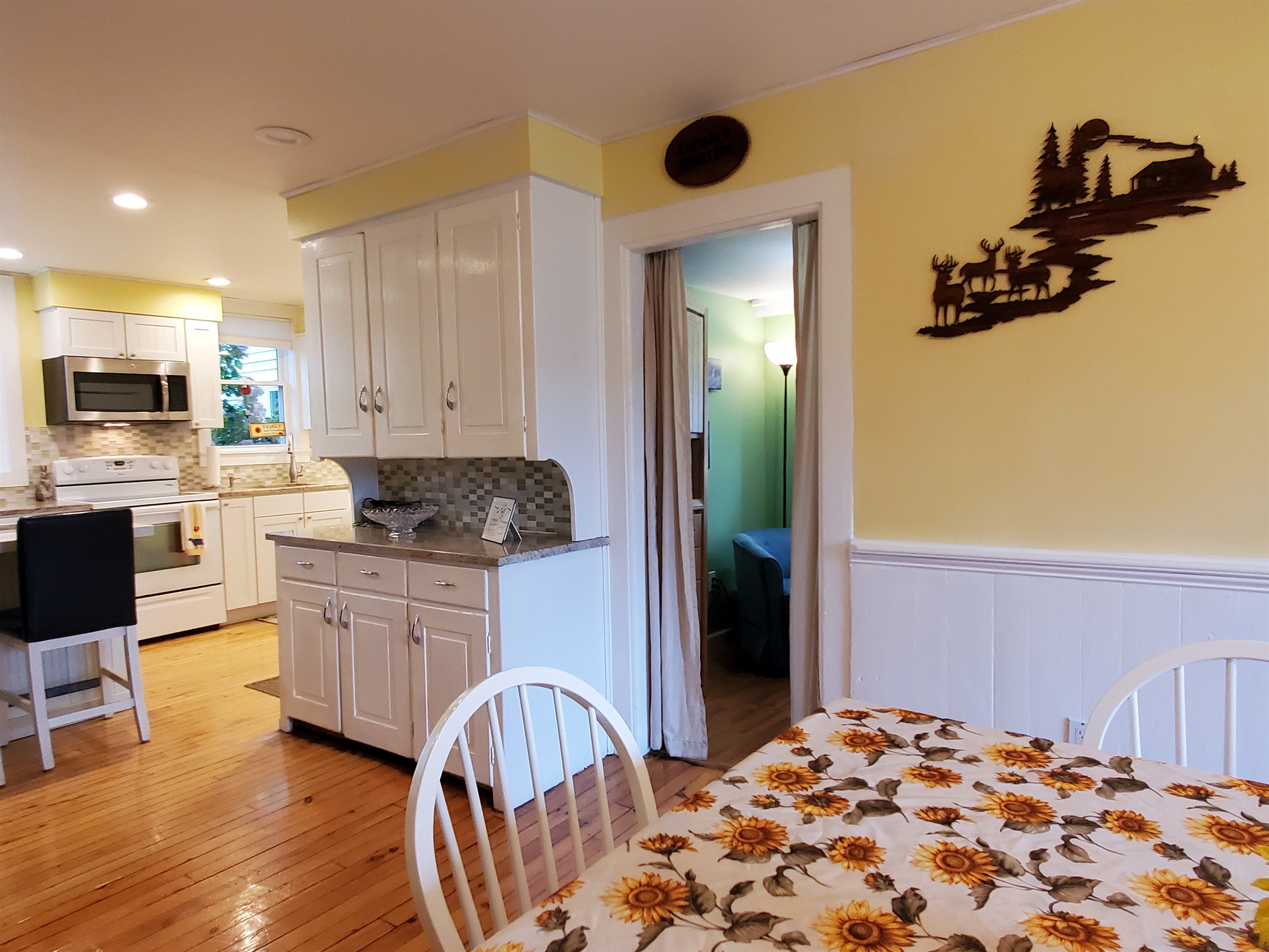 Dining area with doorway to bunk bedroom