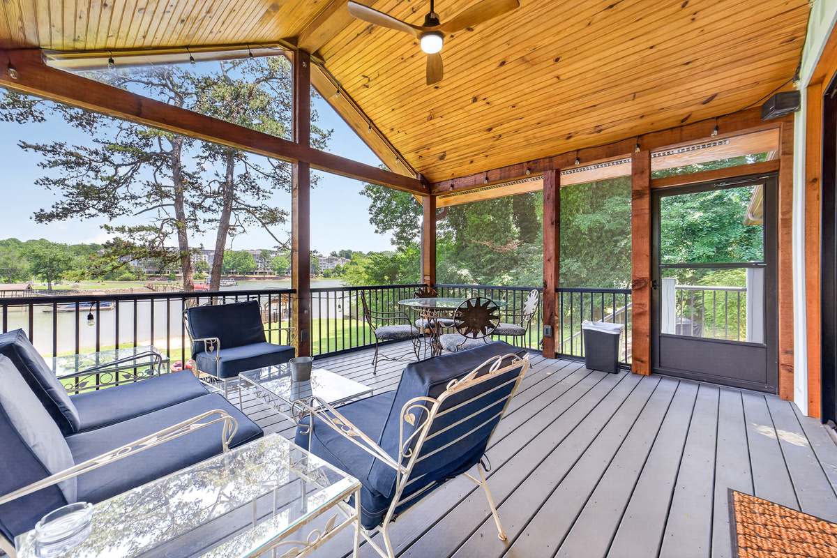 Screened porch perfect for enjoying morning coffee with lake views