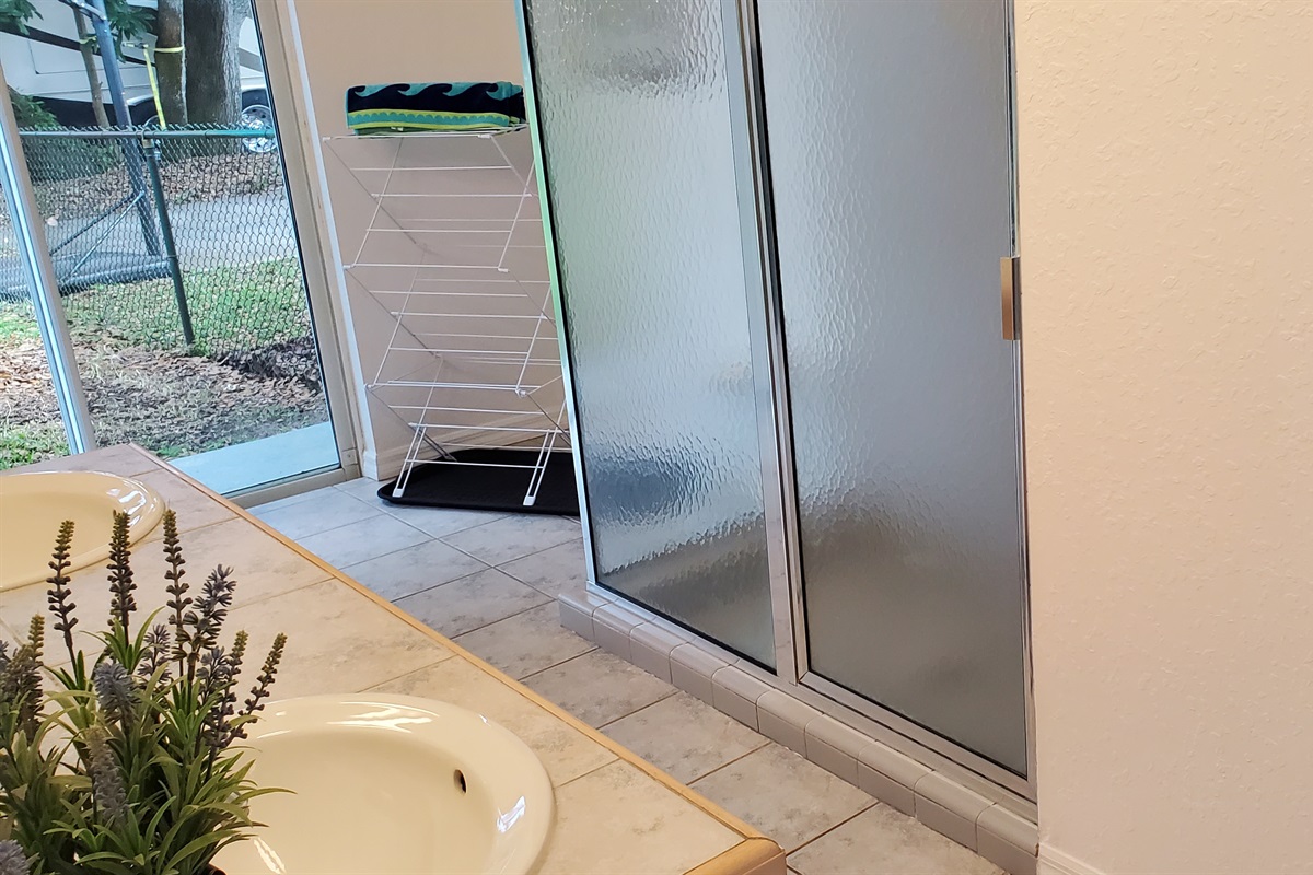 King bedroom bathroom walk in shower and drying rack